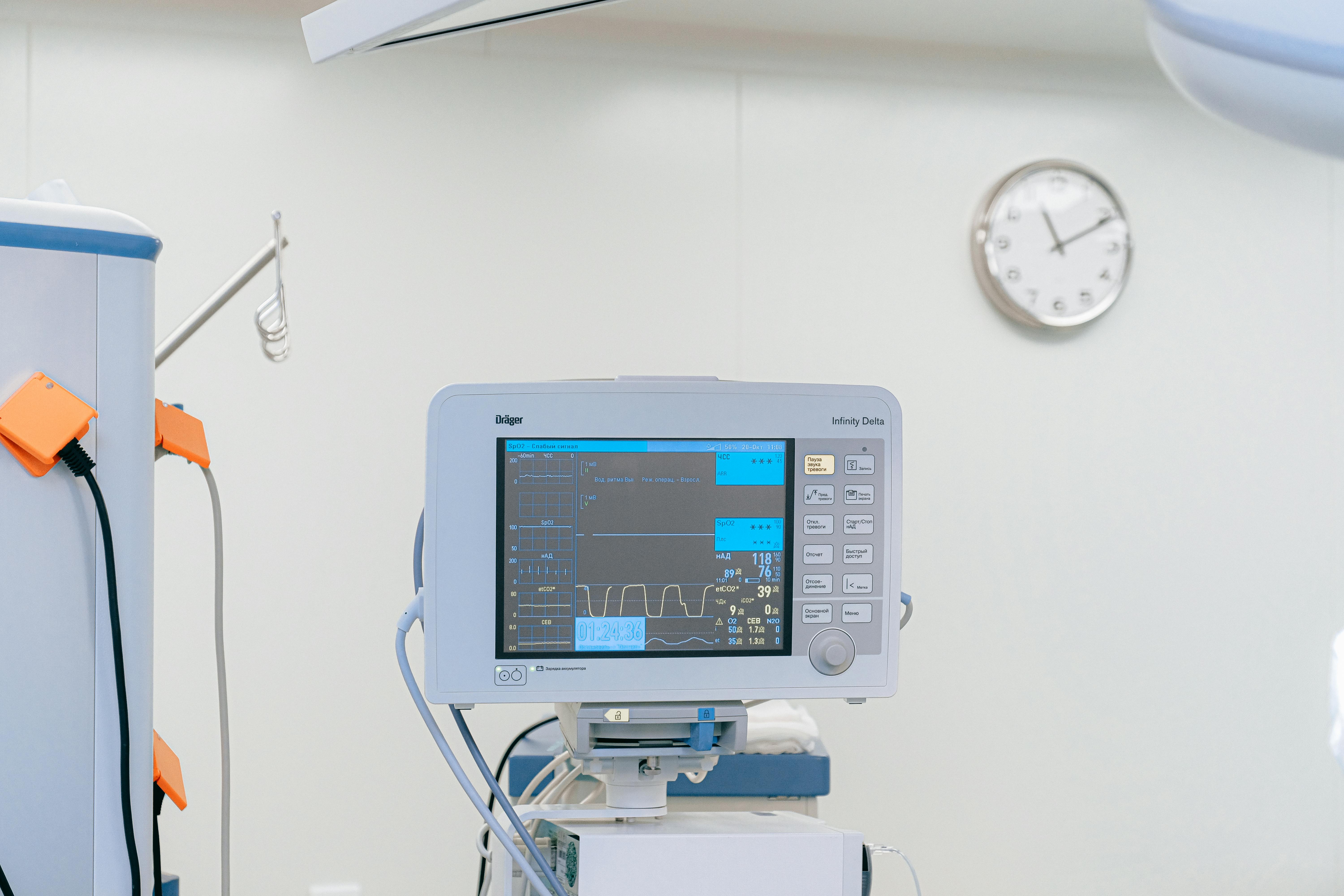 Hospital monitoring equipment displaying vital signs, emphasizing critical infrastructure for emergency medical services and fuel delivery support.